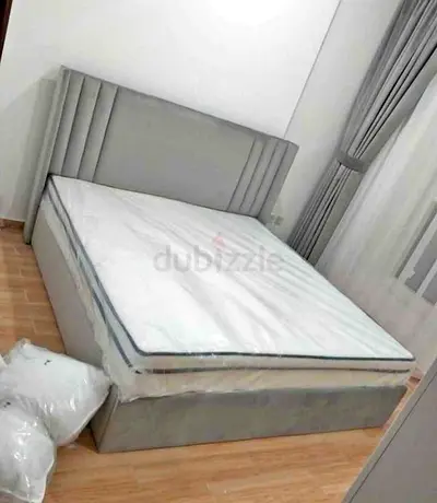 Elegant Gray Upholstered Bed Frame with Mattress