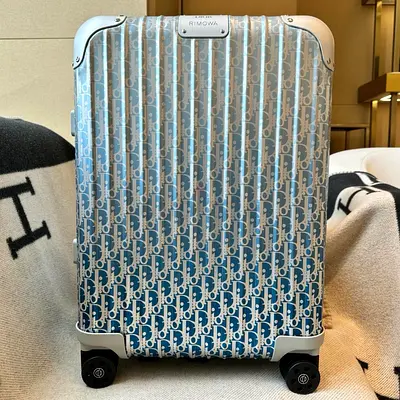 Dior x Rimowa travel troly