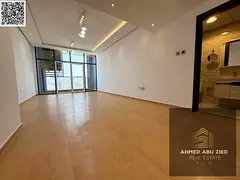 A living room and a hall for annual rent in Ajman Al Nuaimiya, 3 luxurious finishes, in a distinguis