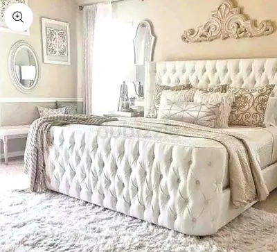 Elegant White Upholstered Bed with Luxurious Design