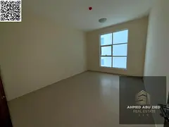 Upscale one-bedroom apartment | 2 bathrooms | Parking | Open view | Fully equipped kitchen | Balcony