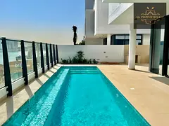 Experience premium beachfront living in this luxurious 5-bedroom duplex standalone villa located in