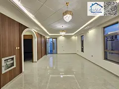 A luxury villa for sale in the Al Bahia area, with two floors and a roof, modern design and spacious