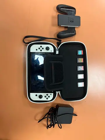 Nintendo Switch 1 Oled with Case, Games, and Accessories