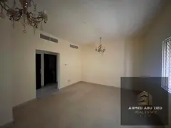 Three-bedroom apartment with hall for annual rent on King Faisal Street, Ajman – featuring 3 bathr