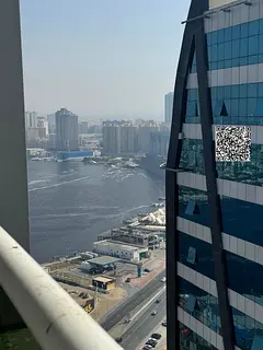 Two bedrooms and aliving room witha balcony and parking