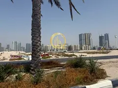 Land in Sharjah with an area of 20,000 square feet, overlooking Al Wahda Street, opposite City Cente