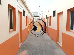 54-Room Staff Accommodation | 8-Person Capacity Each | With Ejari | Main Road Location – Al Sajja 