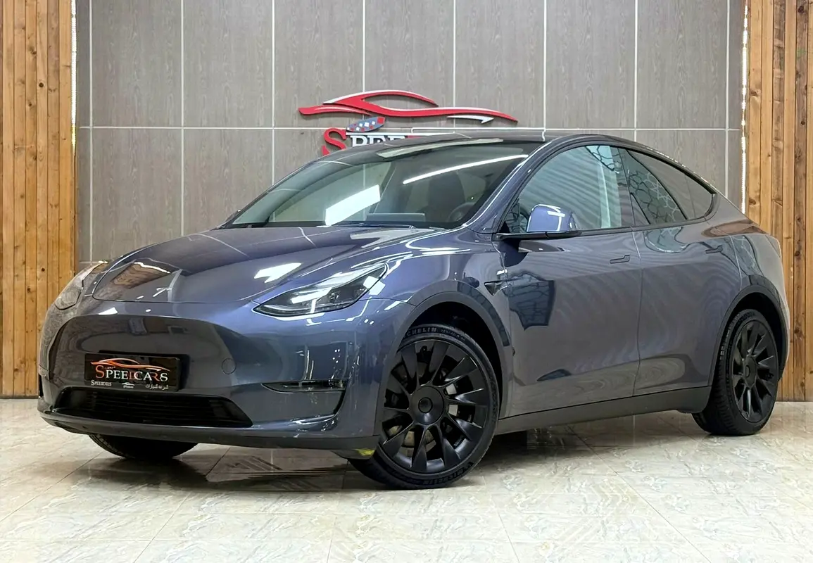 Tesla Model Y 2023 — photo 1 of 16