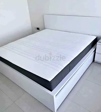IKEA malam king‑size bed (180 × 200 cm) with 2 storage drawers underneath and an IKEA mattress