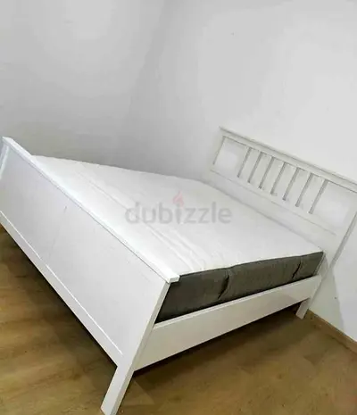 IKEA Hamness queen bed frame with IKEA mattress