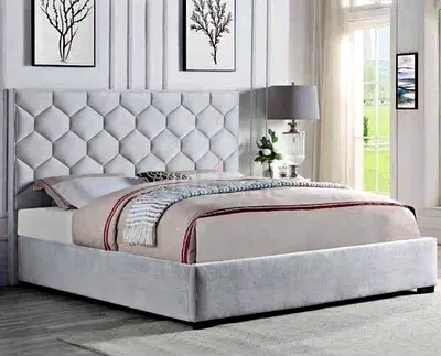 Elegant Grey Upholstered Bed with Stylish Headboard