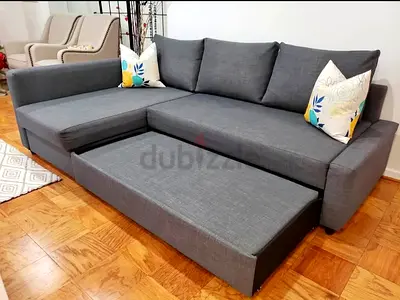 Comfortable Grey Sofa with Pull-Out Bed