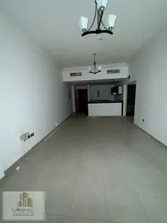 One-bedroom apartment with a living room and American-style kitchen available for rent in Sharjah, A