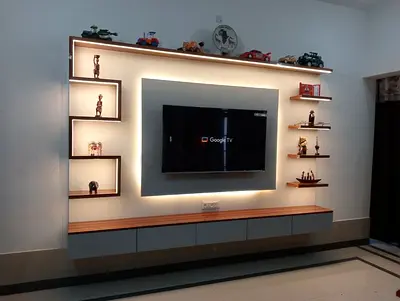 Futuristic Backlit Floating Media Wall with Integrated LED Display Shelves