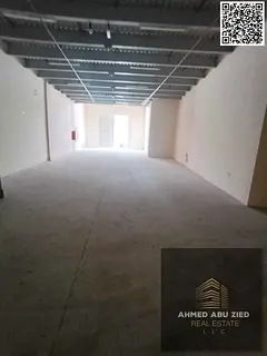 Warehouse in Al Jurf Industrial | Prime location on a main road near key access routes | Ready space
