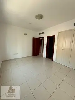 Two-bedroom apartment with a living room, including a master bedroom with built-in wardrobes, balcon