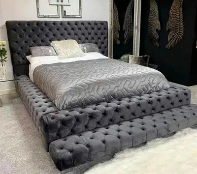 Elegant Grey Upholstered Bed with Plush Base