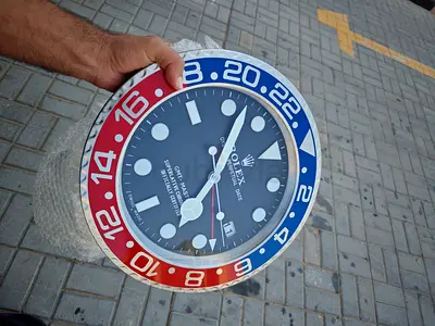 Wall clock Rolex