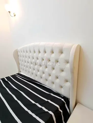 Elegant White Upholstered Bed Frame