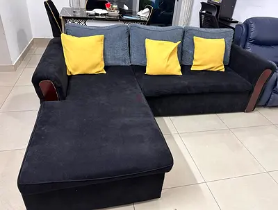 Comfortable Black Corner Sofa with Yellow Cushions