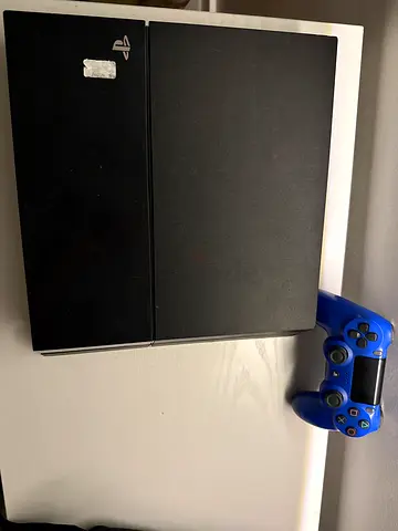 Sony PlayStation 4 Console with Controller