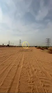 Land for sale in Arqoub Industrial. Area of 10,000 sq ft in an excellent location.