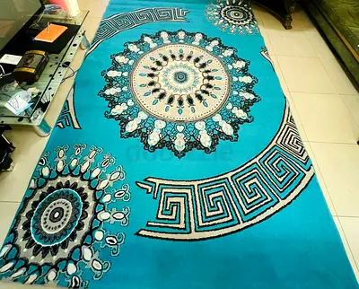 Vibrant Blue Abstract Area Rug with Intricate Designs