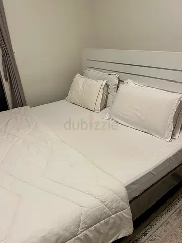 Comfortable King Size Bed with Soft Bedding