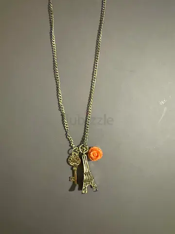 Charming Vintage Silver Necklace with Unique Design. Eiffel Tower, key, and flower charm.