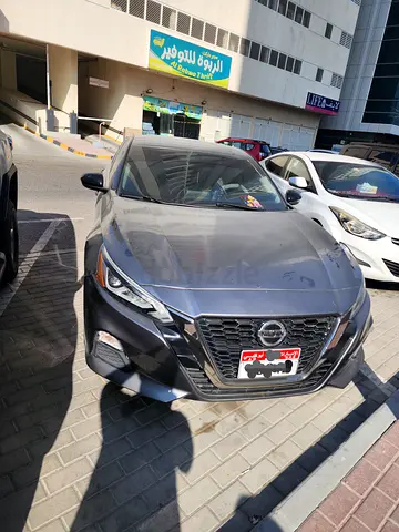2019 Nissan Altima (Silver), Under Bank Loan, leaving the country.