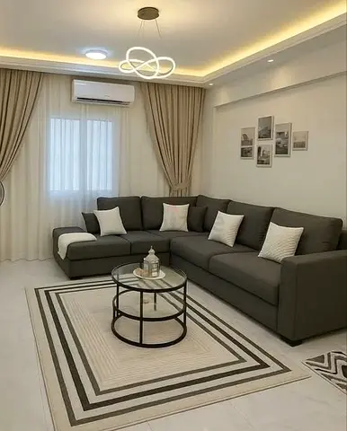 Modern Minimalist Living Room with Charcoal  Beige Accents