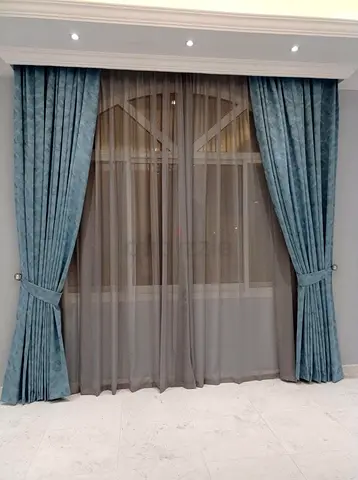Elegant Blue Curtains with Sheer Overlay