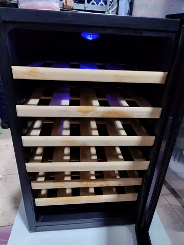Vinocave latest model wine fridge 30 bottles capacity. Compact Design with wooden shelves