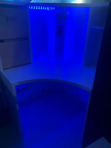 Corner study table with led lights and car sticker and a hook