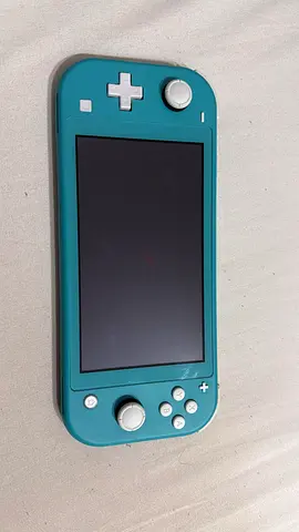 Nintendo Switch Lite in Great Condition(turquoise colour)