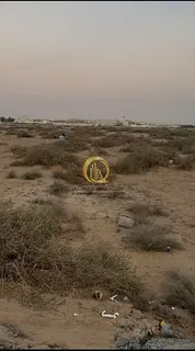 For sale: industrial land in the Al-Sajaa Industrial Area. Area: 13,623 sq. ft. Located on two stree