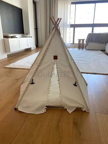 A cozy teepee house is designed for comfortable rest for cats and small dogs. These tents create a p
