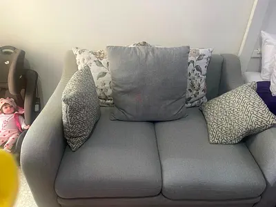 Comfortable Gray Sofa with Accent Pillows