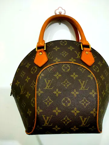 Louis Vuitton Meltis MM Handbag