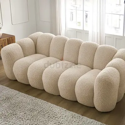 Cozy Beige Curved Sofa for Sale