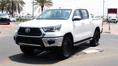 Toyota Hilux SR5 2.4L diesel  . White 2025 model, M/T Wide body with Chrome bumper