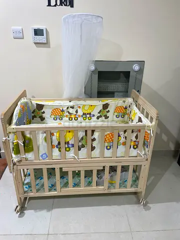Comfortable Baby Crib with Canopy actual price is 550 selling for 300