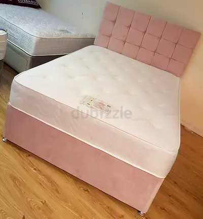 Elegant Pink Bed with Soft Upholstered Headboard