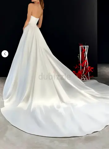 Elegant White Wedding Dress with Dramatic Train and V shape