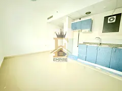 Bright spacious studio in very Prime location open view free gym and pool very Easy Exit to Dubai