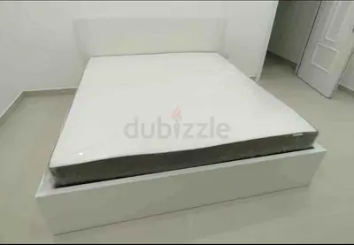 IKEA malam king‑size bed (180 × 200 cm) with 2 storage drawers underneath and an IKEA mattress