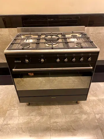 SMEG ( top gass oven electric ) 5 burner oven dual fan cooking range 90x60 stove
