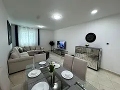 Two bedrooms and a living room for monthly rent in Ajman Corniche, among the cleanest apartments and