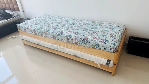 Stylish Wooden Bed with Floral Mattress